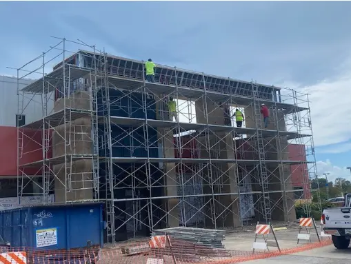 Crew performing concrete restoration